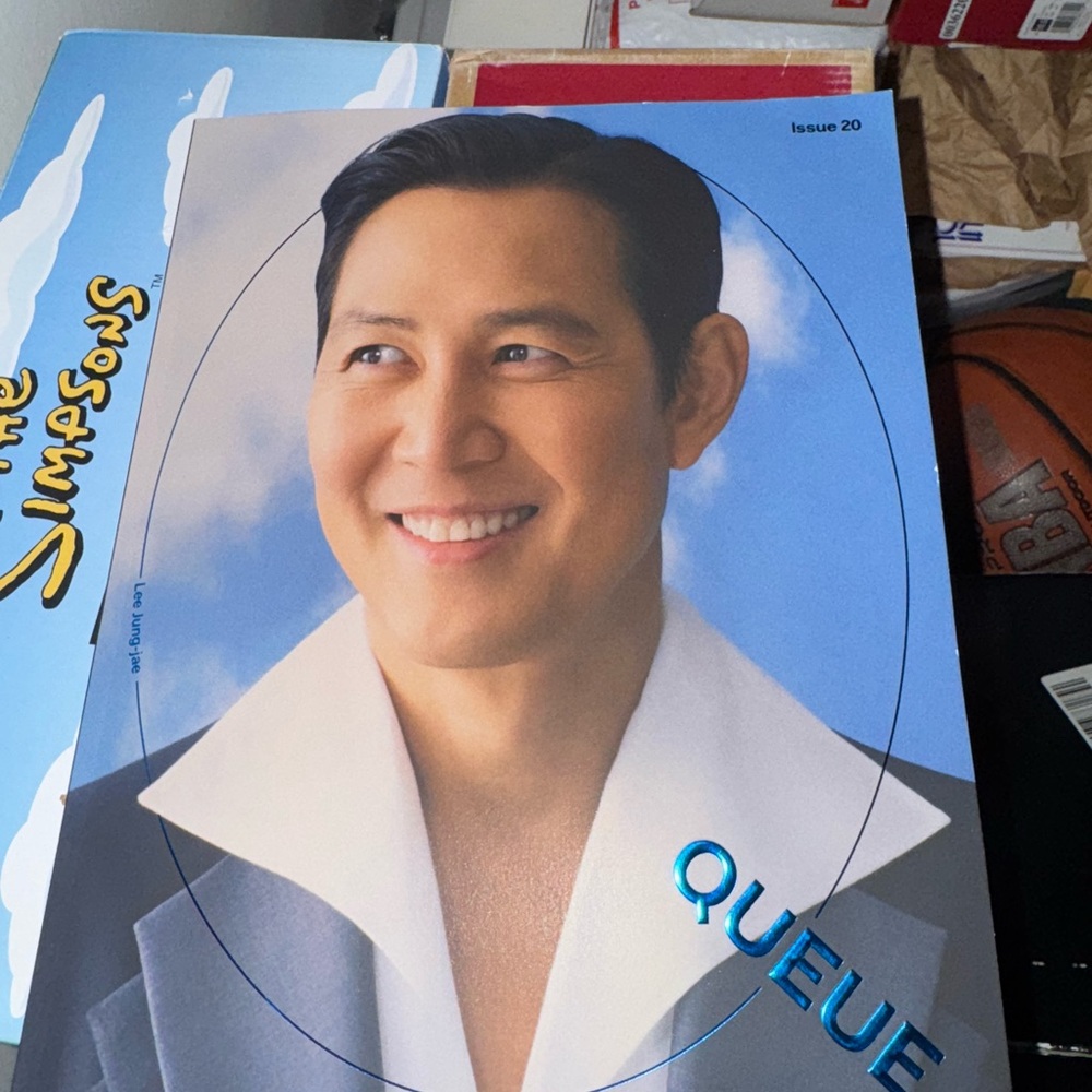 Netflix Queue Magazine with Blue and White Cover